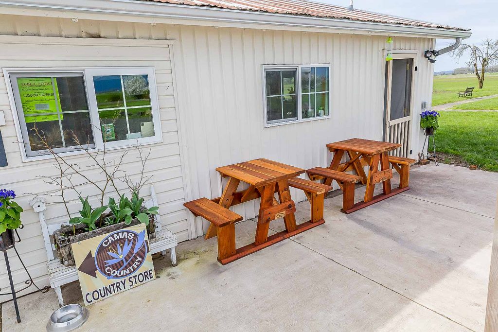 Store with Redwood Tables Outdoors